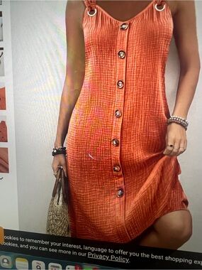 Sleeveless Orange Light Weight Midi Dress with decorative buttons.